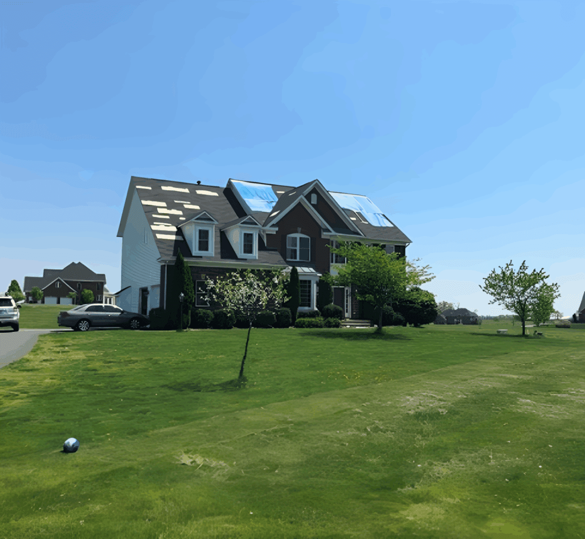 House with solar panels on sunny day.